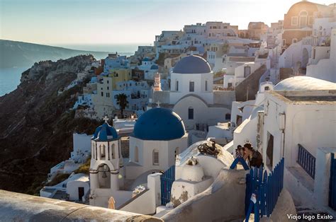 Maravilhados Com A Ilha De Santorini Na Grécia Viajo Logo Existo