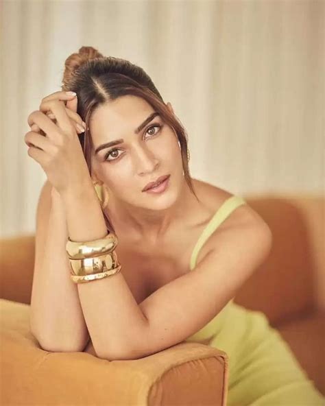 Photo Gallery Kriti Sanon Flaunts Her Toned Legs In A Yellow Dress See Her Gorgeous Pics