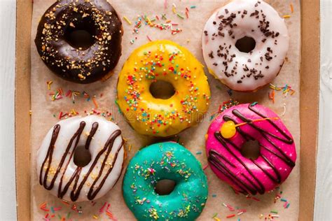 Donuts In Glaze With Sprinkles In A Box Stock Image Image Of Calories