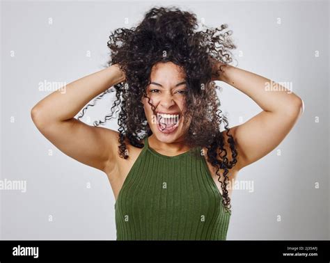 The Natural Hair Struggle Is Real Studio Shot Of A Woman With Messy