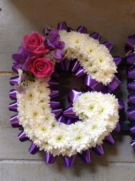 If these flowers are for a funeral, please make sure to inform us in the instructions box of the name of the deceased, as well as the name of the funeral director. Letter funeral flowers deep purple and hot pink. www ...