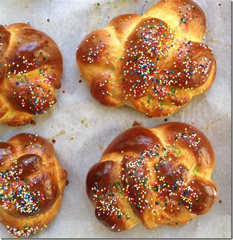 This easter breads recipe produces a billowy soft, beautifully golden and lightly sweet bun with a perfectly cooked egg. Italian Easter Bread-An Easter Wreath Bread - Savoring Italy
