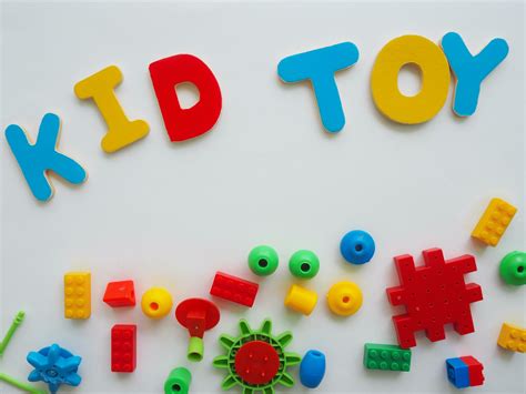 bebé niños juguetes marco en fondo, juguete muchos vistoso educativo de