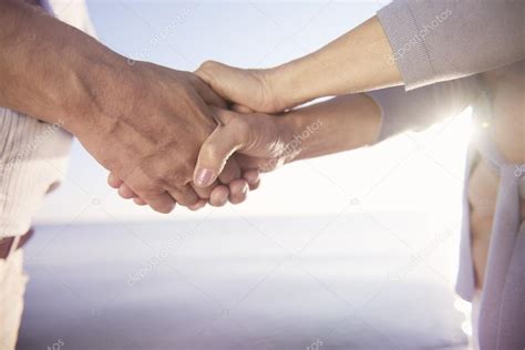 Senior Couple Holding Hands Together — Stock Photo © Gpointstudio