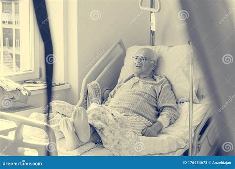 Elderly Man Laying On A Bed In Hospital Stock Image Image Of