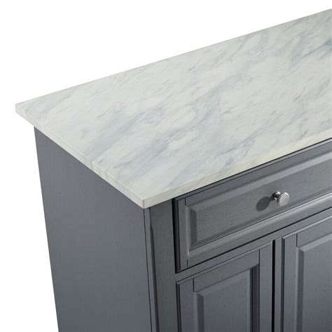 Whether you need more counter space or simply want to bring the modern look into your kitchen, this stylish, rolling kitchen island helps with everything from mealtime prepare and serving. Andover Mills™ Moser Kitchen Island with Faux Marble Top ...