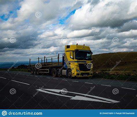 Yellow Truck Parked On Side Of The Road Editorial Stock Image Image