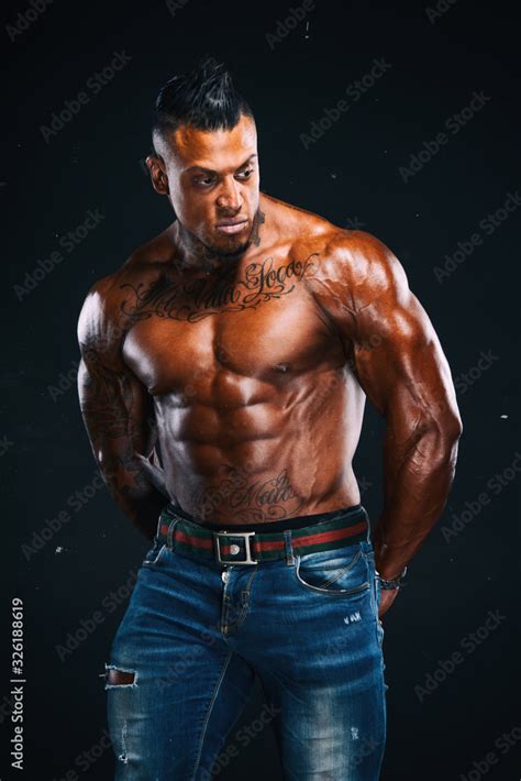 Hnadsome Shirtless Muscular Men In Jeans Posing Stock Photo Adobe Stock