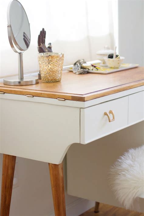 It's very important that the vanity is flush against the wall. DIY Vanity from a Vintage Sewing Table » Lovely Indeed