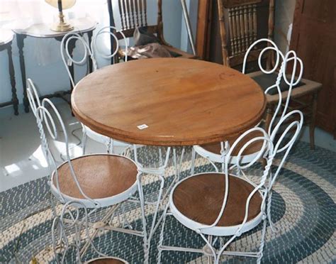 Made with polished chrome or ebonized wood legs, and available in three lengths with a choice of finishes, it serves as a bench, low table, or foundation for the basic cabinet series. ANTIQUE ICE CREAM TABLE AND CHAIRS | ANTIQUE ICE CREAM ...