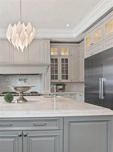Serving broward county, miami dade and palm beach. Cream gray cabinets with marble countertops & tile ...