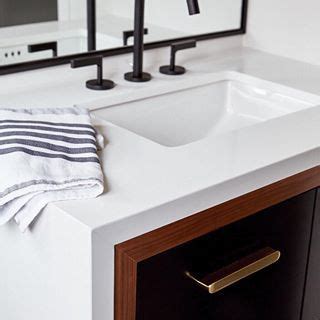 This kes single handle waterfall bathroom vanity sink faucet is such a well made, solid, heavy and elegant faucet. The sleek waterfall edge on this bathroom vanity ...