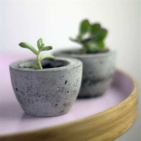 set of two mini concrete planters by bells and whistles make
