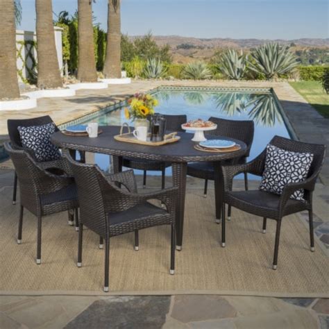 Tannis Outdoor 7 Piece Multi Brown Wicker Oval Dining Set With Stacking