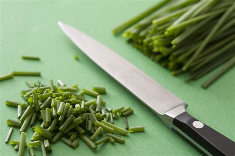 Cutting Chives On Green Chopping Board 9889 Stockarch Free Stock