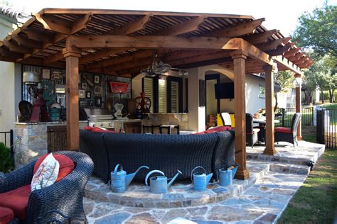 Make your outdoor kitchen dreams a reality. Pergola, Outdoor Kitchen, Fireplace, Flastone Patio ...