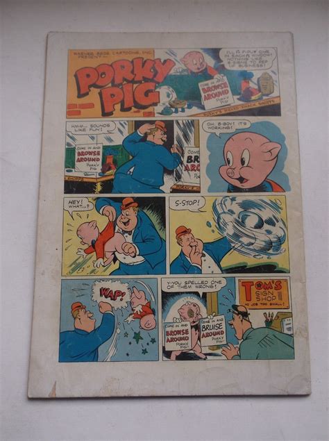 Dell Four Color Porky Pig In Roaring Rockets Wbugs Bunny Cover