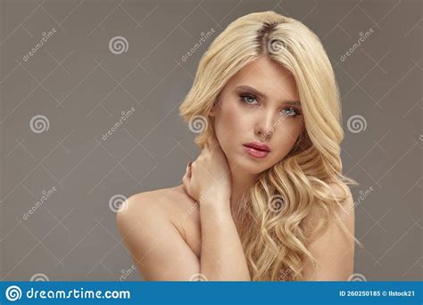 Blonde European Woman With Curly Hair Beauty Model On Beige Isolated Stock Image Image Of