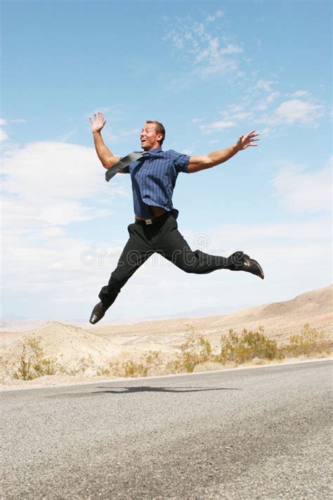 Ecstatic Business Man Jumping In The Air Stock Image Image Of