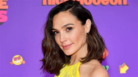 gal gadot turns up the heat in barely there bikini as she lounges by the pool hello