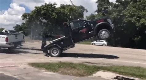 Ford F 250 Pickup And Tow Truck Get Caught In Strange Tug Of War