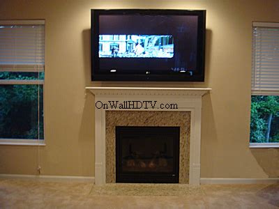 Whether it is faced with wood, stone, concrete, or tile. tv too big over fireplace | Tv over fireplace