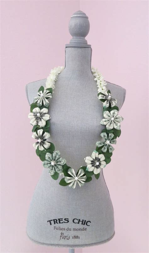 Learn how to make an origami money flower and turn it into a necklace. Money lei, Graduation lei - Perfect for your special event ...