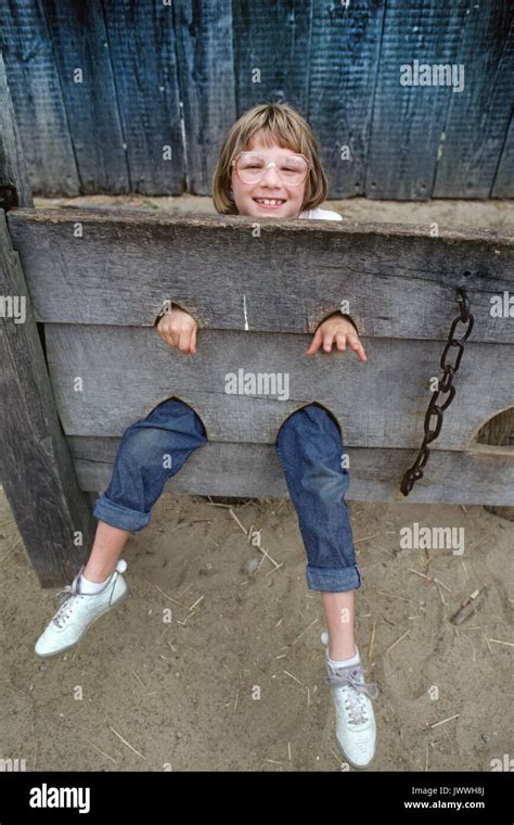 A Young Girl Locked In A Pillory Or Set Of Stocks At Plimoth