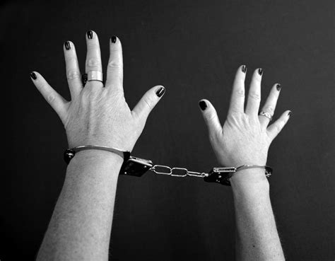 Unrecognizable Woman With Handcuffs On Hands Over Head Free Image Download