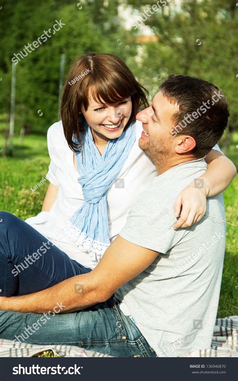 Happy Couple Laughing And Having Fun Together Outdoor Stock Photo