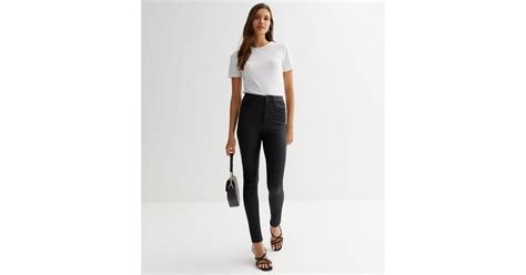 black coated leather look lift and shape jenna skinny jeans new look
