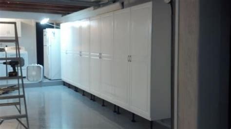 An economic garage or utility room black storage cabinet system from closetmaid with european style hinges, tough laminated garage cabinets. ClosetMaid Dimensions 48 in. Cabinet in White 13000 at The ...