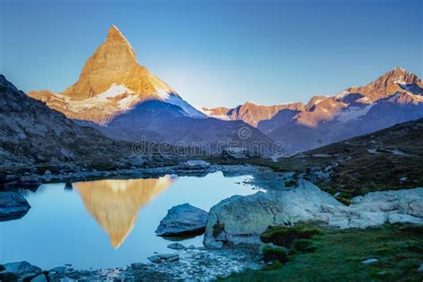 Matterhorn Iconic Mountain And Lake Relfection At Peaceful Sunrise