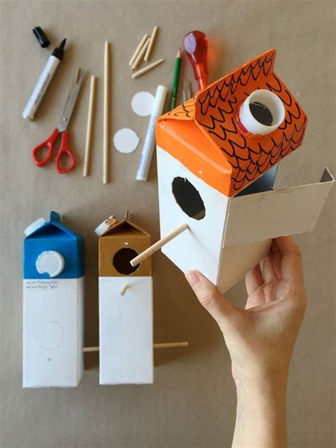 Welcome spring with this cheerful little bird house craft, simple enough for young crafters. Make Your Own Milk Carton Birdhouse Village | Handmade ...