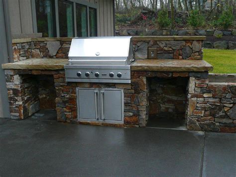 Stone bbq island with bar depth top & gas grill. stone-bbq - Home Construction & Remodel Vancouver, WA