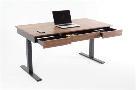 Users that are taller than 6'5 will need to look at desks that rise beyond 47 for proper standing ergonomics. Woolsey Standing Desk with Three Drawers and Wireless Charging