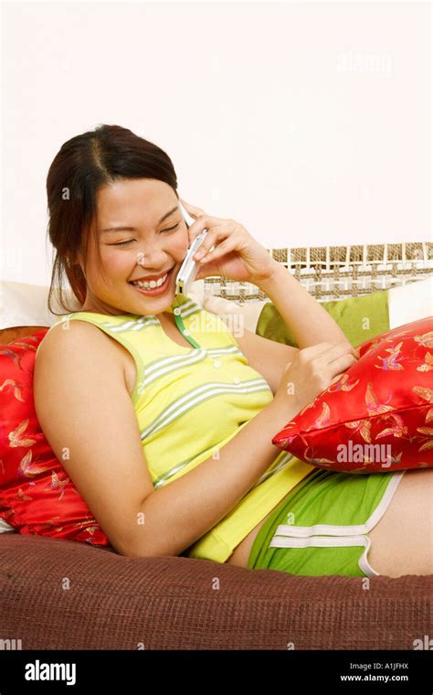 Young Woman Using A Mobile Phone Stock Photo Alamy