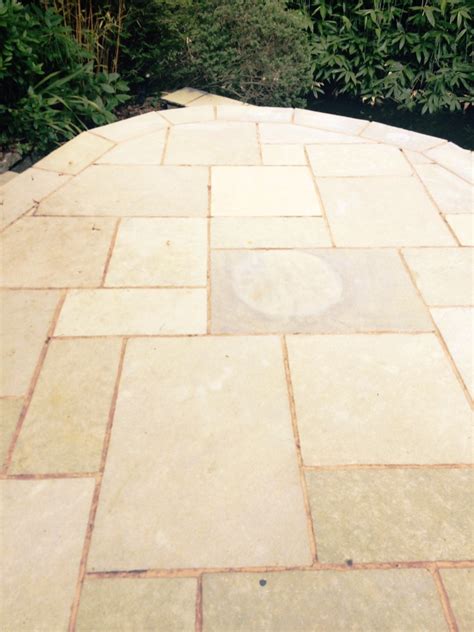Green Indian Limestone Patio Treated For Heavy Staining In Windermere