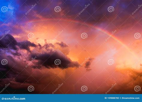 Rainbow In The Clouds After A Storm During Sunset Stock Photo Image