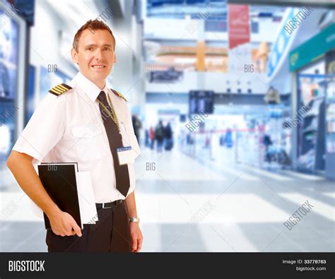 Airline Captain Pilot Image And Photo Free Trial Bigstock