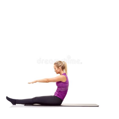 Warming Up Below Copyspace A Young Woman Sitting On A Mat And