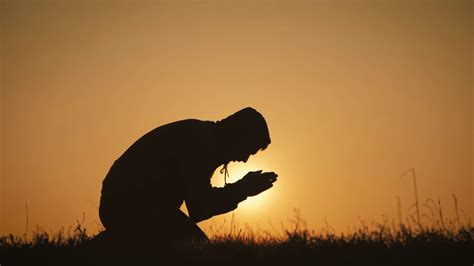 Young Man Praying At Sunset Seeking Solace Stock Footage Sbv 334771979