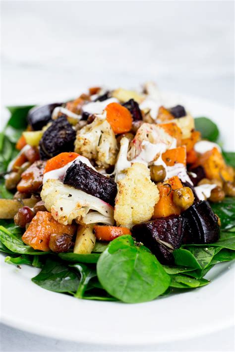 It's packed with oven roasted potatoes, french lentils and fresh spring vegetables. Roasted Vegetable Salad with Lemon Tahini Dressing - Love ...