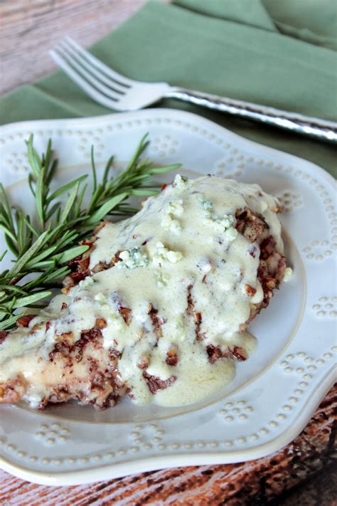 Spoon chicken mixture over dough. Pecan Chicken with Blue Cheese Sauce - Kudos Kitchen by Renée