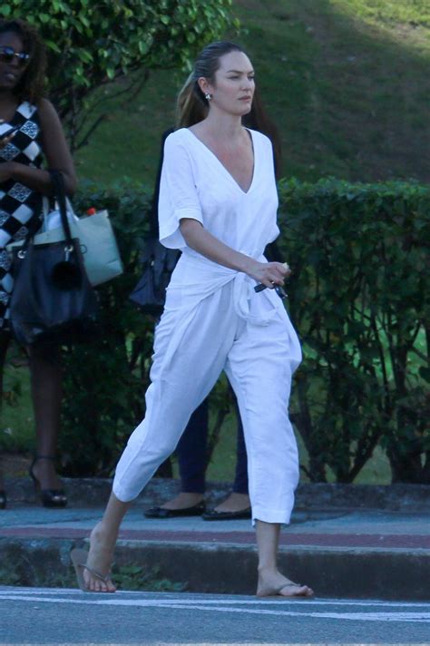 Candice Swanepoel In White Jumpsuit 15 Gotceleb