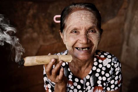 Woman In Bagan Myanmar Smoking A Cheroot Insight Guides Blog