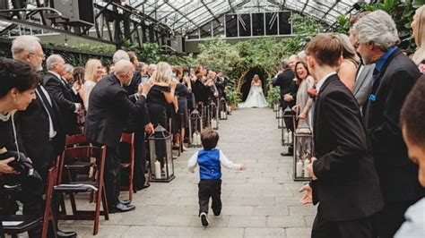 2 year old steals the show at mom s wedding after running down the aisle to greet her good