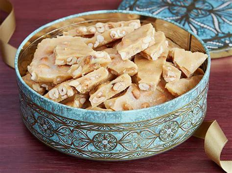 There are a few things that remind us that christmas is in the air. Peanut Brittle from Trisha Yearwood's Georgia Cooking in ...