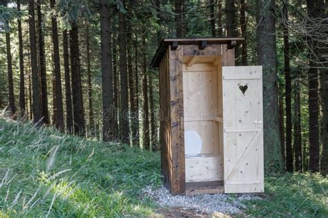 New Open Wooden Outdoor Toilet Outhouse In Forest In Beskid Mountains