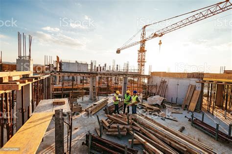 Investors And Contractors On Construction Site Stock Photo - Download Image Now - iStock